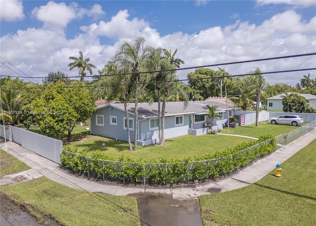 single story home with a front yard