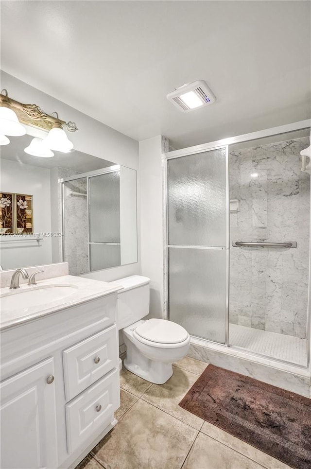 bathroom with tile floors, an enclosed shower, toilet, and oversized vanity