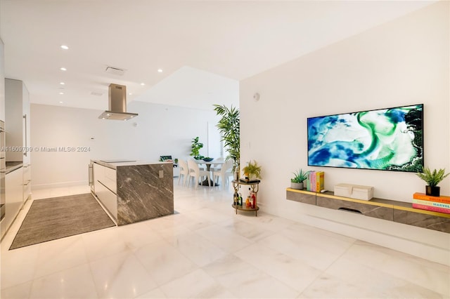 interior space featuring black electric cooktop and range hood