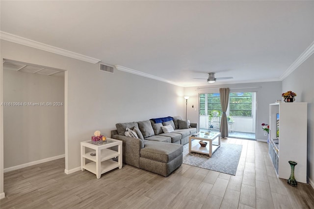 living room featuring crown molding, ceiling fan, and wood-type flooring