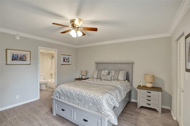 bedroom featuring ornamental molding, ensuite bathroom, and ceiling fan