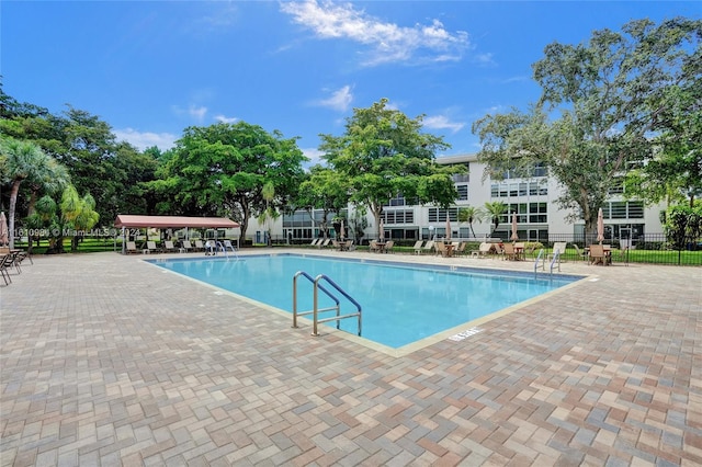 view of swimming pool featuring a patio