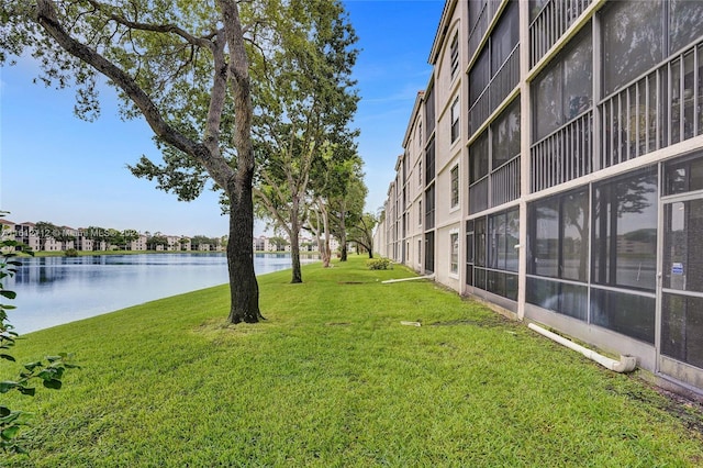 view of yard with a water view