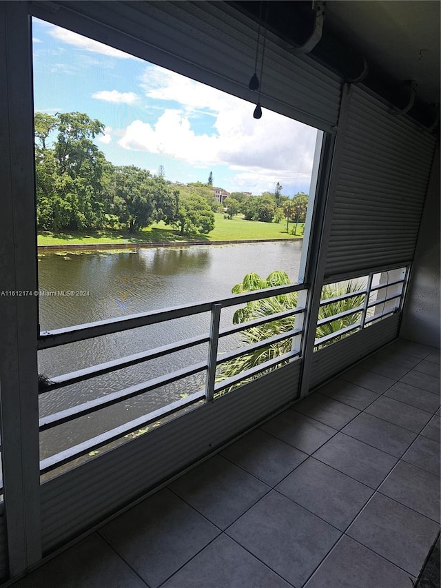 balcony featuring a water view