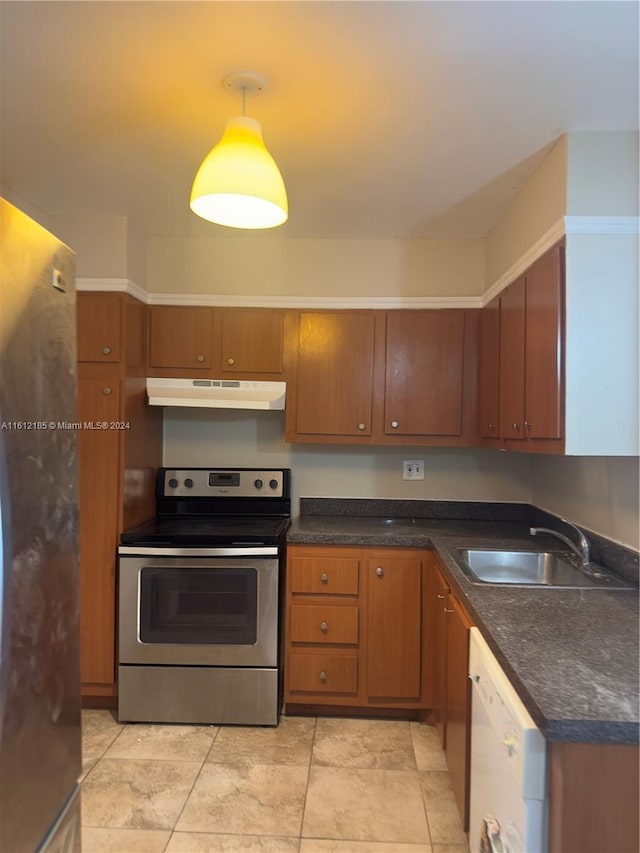 kitchen featuring sink, refrigerator, white dishwasher, decorative light fixtures, and stainless steel range with electric cooktop