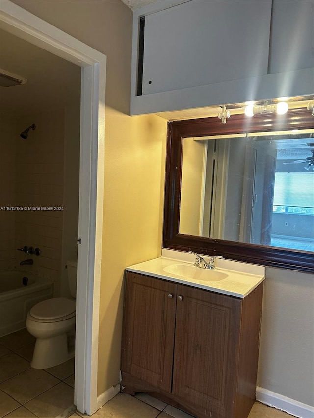 full bathroom with tile patterned flooring, vanity, toilet, and shower / bathing tub combination