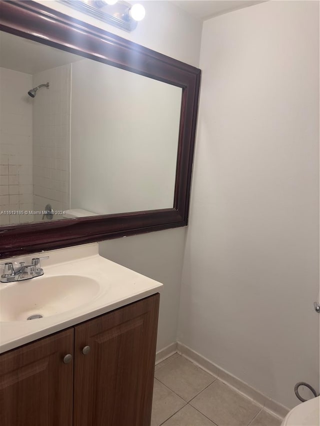 bathroom featuring tile patterned floors and vanity