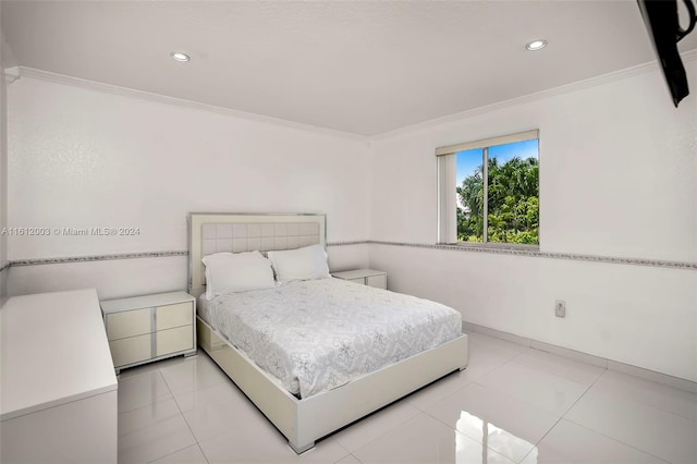 tiled bedroom featuring crown molding