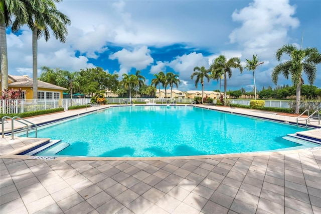 view of swimming pool featuring a patio