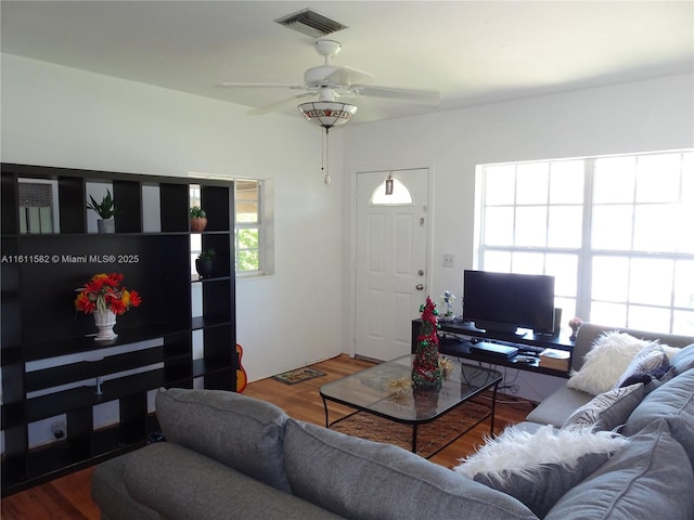 260 NW 119th St, Miami, FL 33168 - living room featuring ceiling fan, wood finished floors, and visible vents