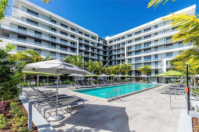 view of swimming pool with a patio