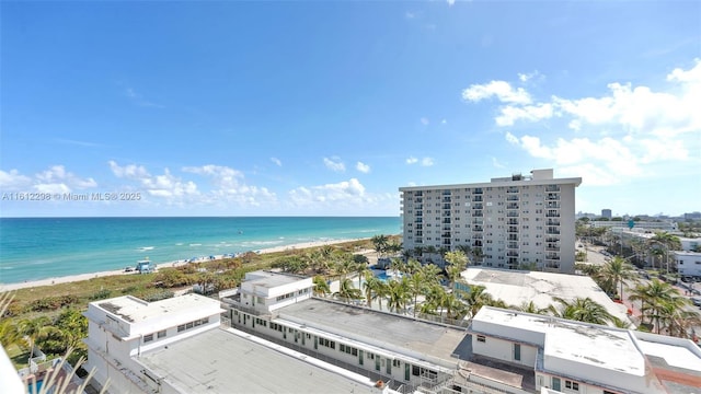 aerial view with a beach view and a water view