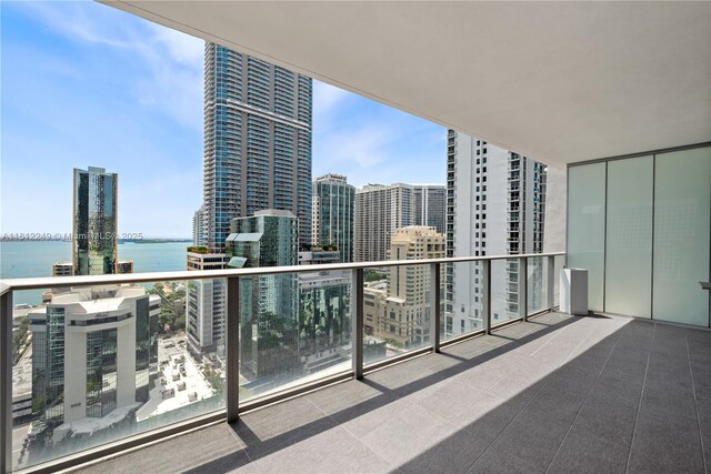 1010 Brickell Ave Unit 2201, Miami, FL 33131 - balcony featuring a water view and a city view