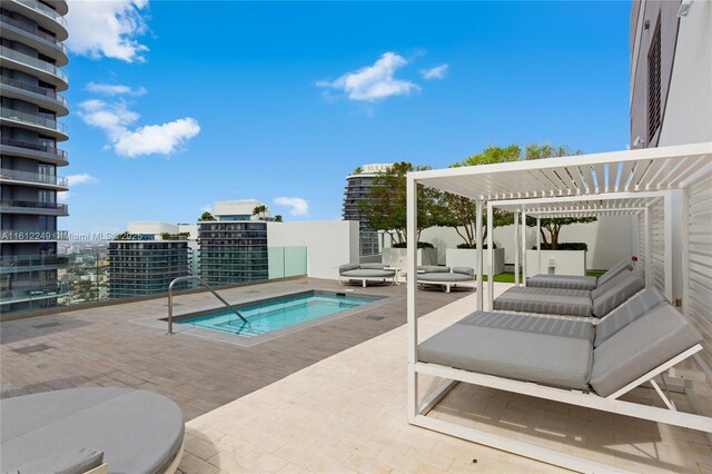1010 Brickell Ave Unit 2201, Miami, FL 33131 - view of pool with a hot tub, a patio, and a pergola