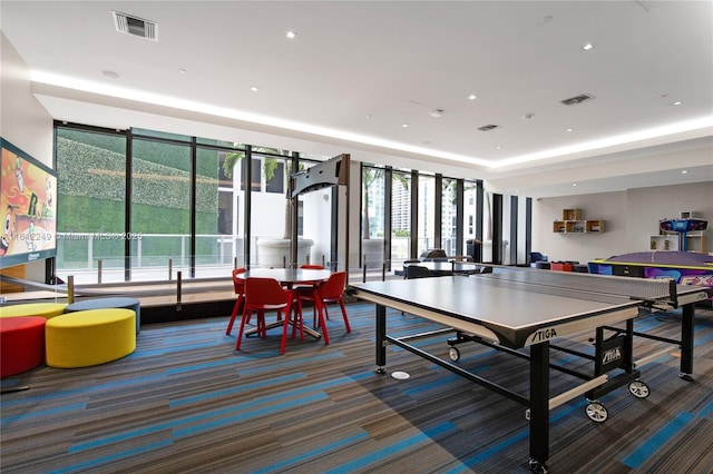 1010 Brickell Ave Unit 2201, Miami, FL 33131 - game room with carpet floors and a raised ceiling
