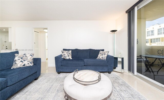 living room featuring tile flooring