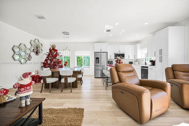 living room featuring light wood-type flooring