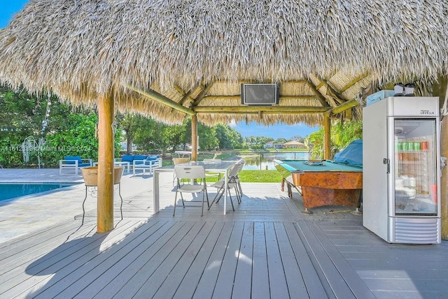 wooden terrace featuring a gazebo