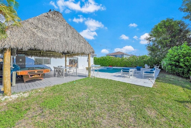 view of yard featuring a pool side deck