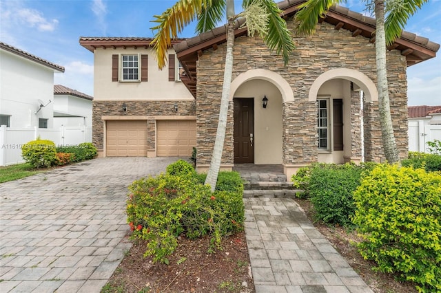 view of front of house with a garage