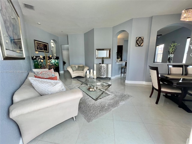 living room featuring tile flooring