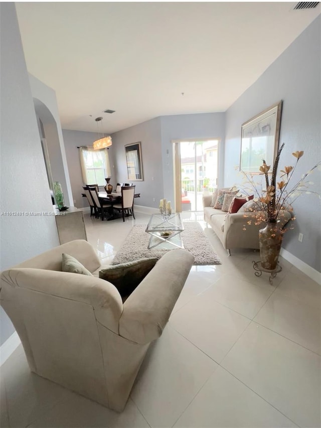 living room featuring tile floors