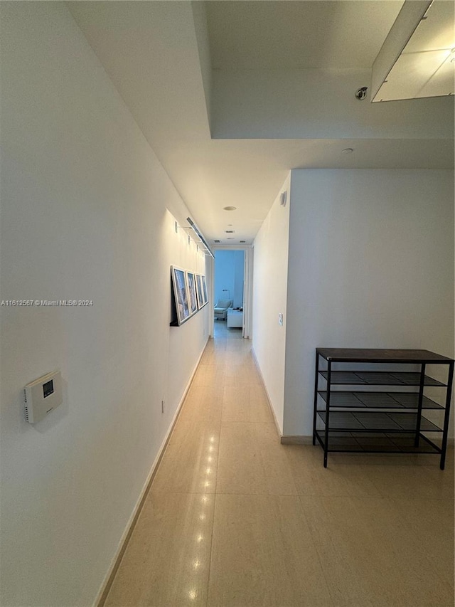 corridor with baseboards