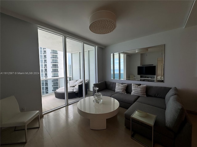living area featuring a wall of windows