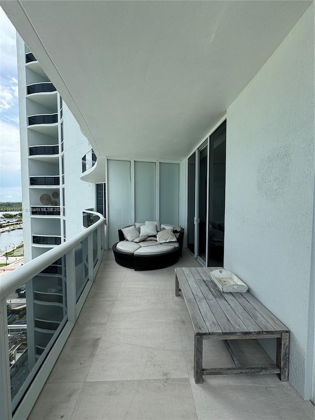 balcony featuring a water view