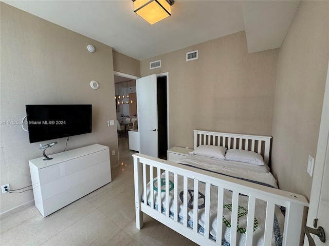 bedroom with visible vents