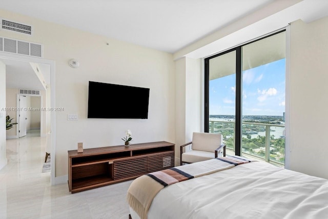 bedroom with multiple windows