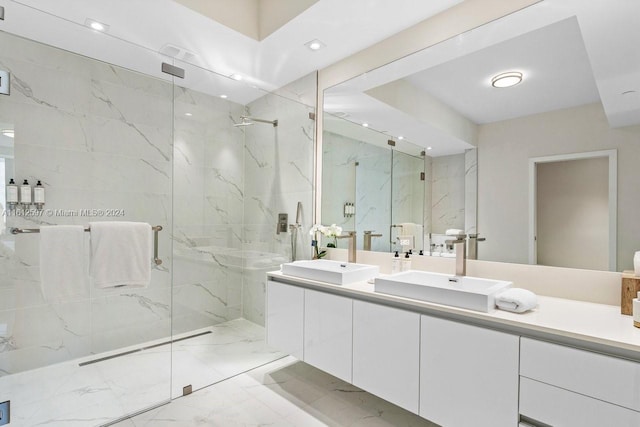 bathroom with vanity and an enclosed shower