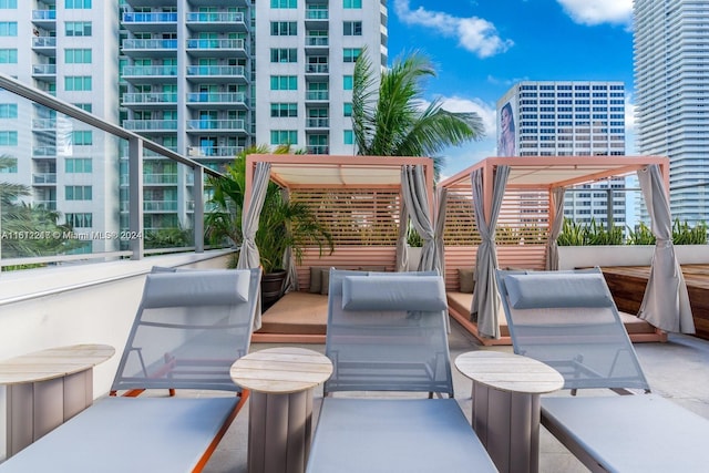 view of patio with a balcony