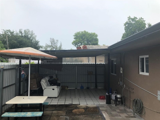 wooden deck with a patio