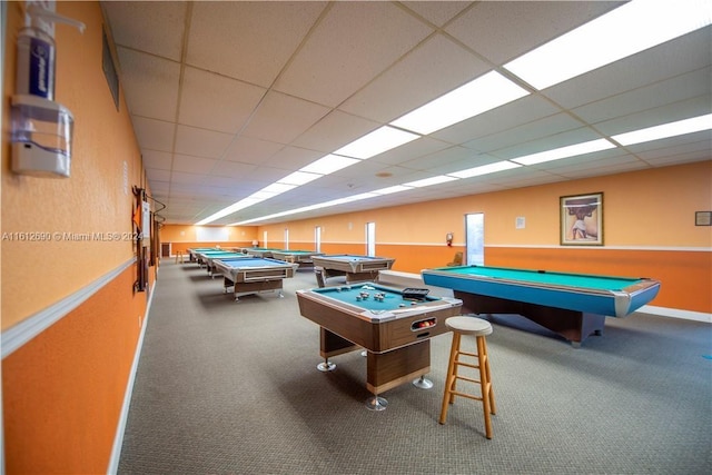 rec room with carpet, pool table, and a paneled ceiling