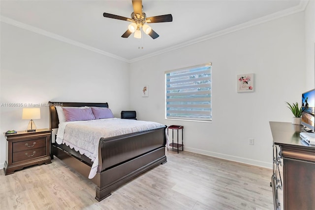 bedroom featuring light wood-style flooring, baseboards, ceiling fan, and crown molding