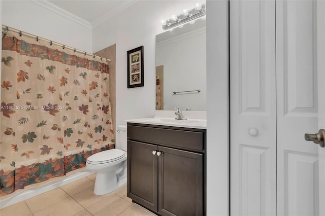 bathroom featuring vanity, toilet, tile floors, and ornamental molding