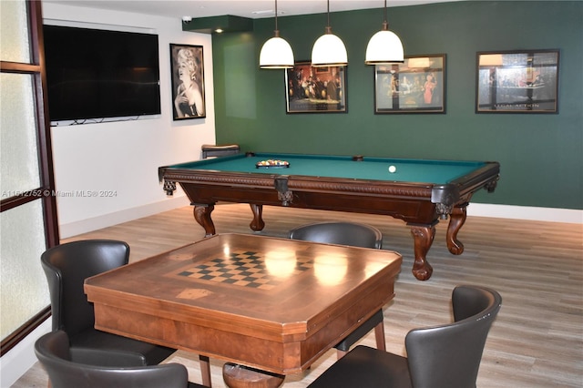 rec room with pool table and light hardwood / wood-style floors