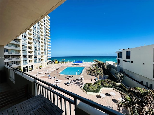 balcony featuring a water view