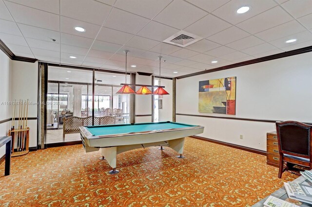 rec room featuring floor to ceiling windows, carpet, billiards, and ornamental molding