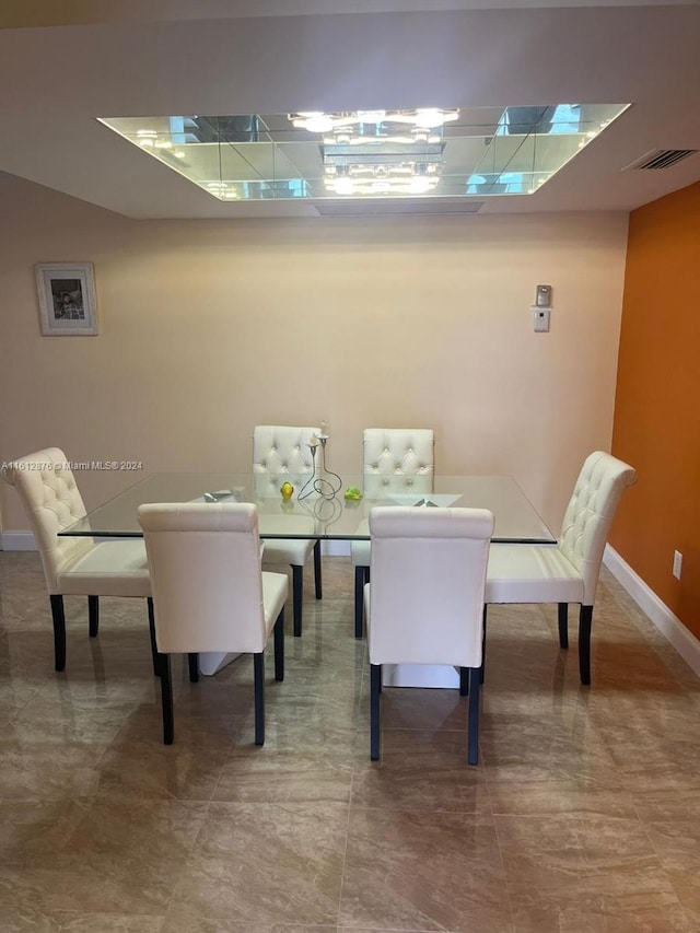 view of tiled dining area