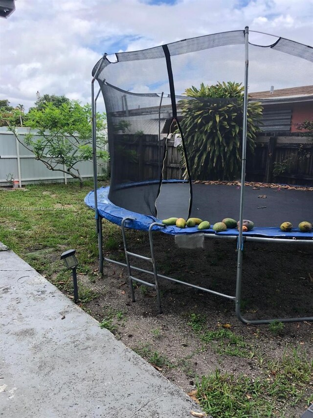 view of yard featuring a trampoline