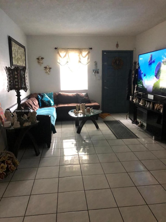 living room featuring light tile patterned flooring