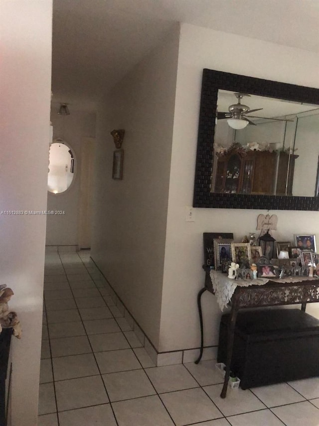 hallway featuring tile patterned flooring