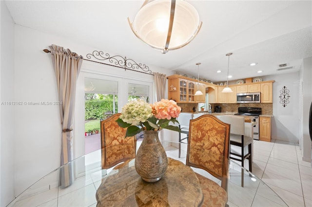 view of tiled dining space