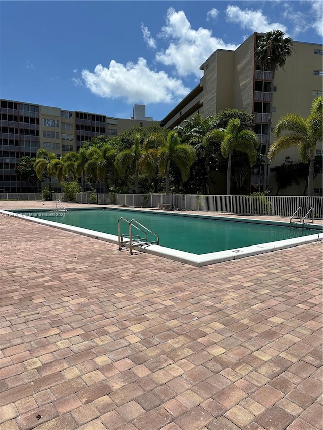 view of pool with a patio