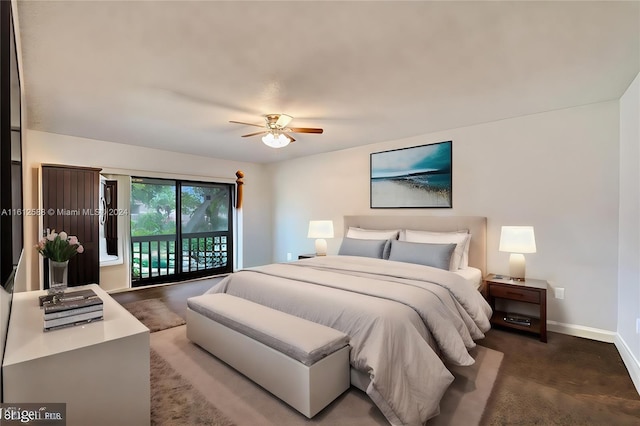 bedroom with access to exterior, ceiling fan, and dark colored carpet