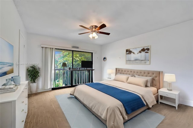 bedroom featuring access to exterior, ceiling fan, and light hardwood / wood-style floors