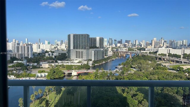 property's view of city featuring a water view