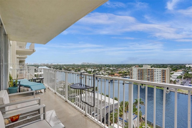 balcony featuring a water view